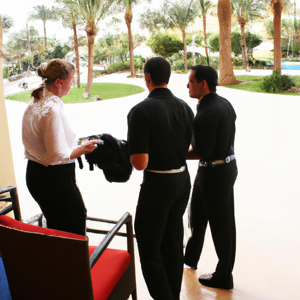Person assisting hotel guests professionally