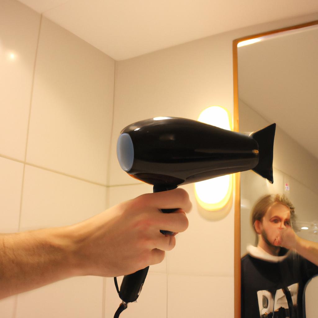 Person using hairdryer in hotel