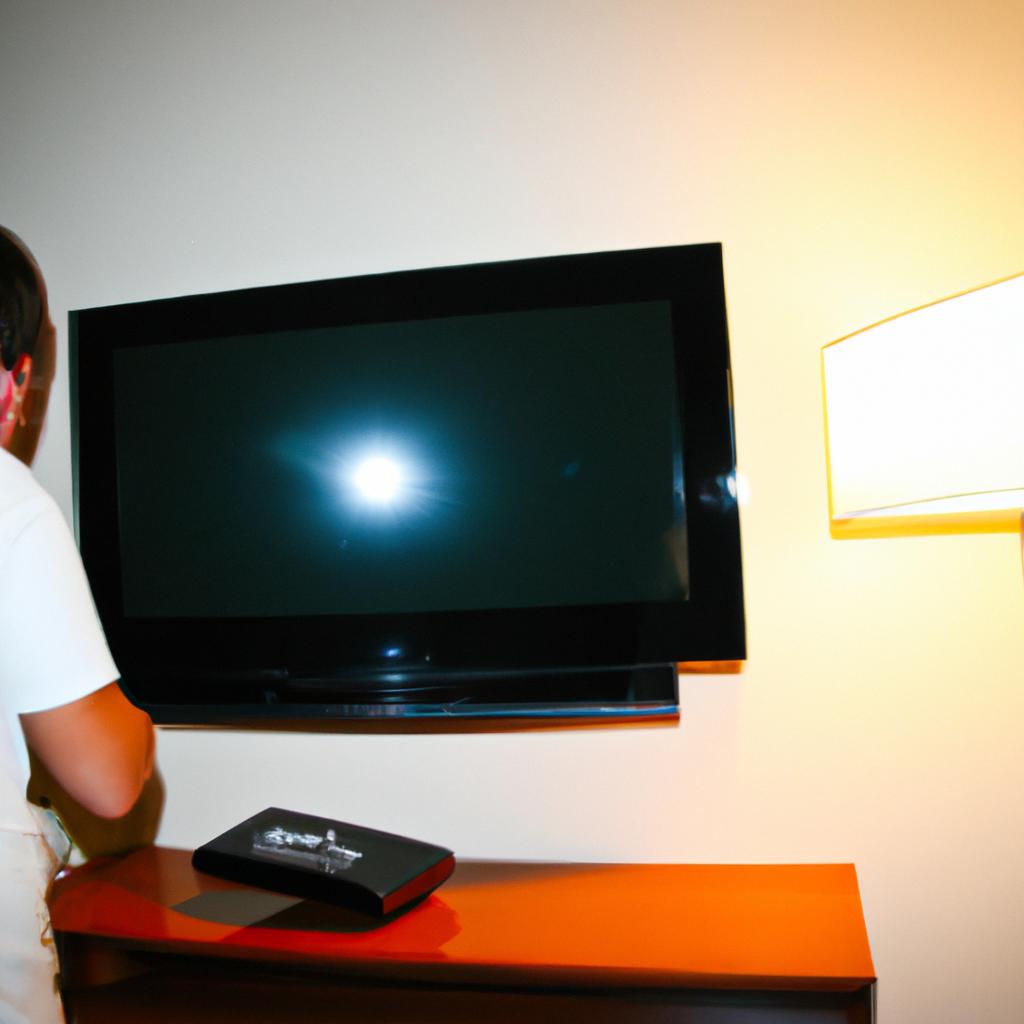 Person using HDTV in hotel
