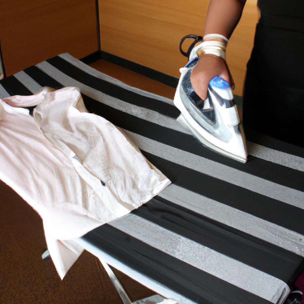 Person ironing clothes in hotel