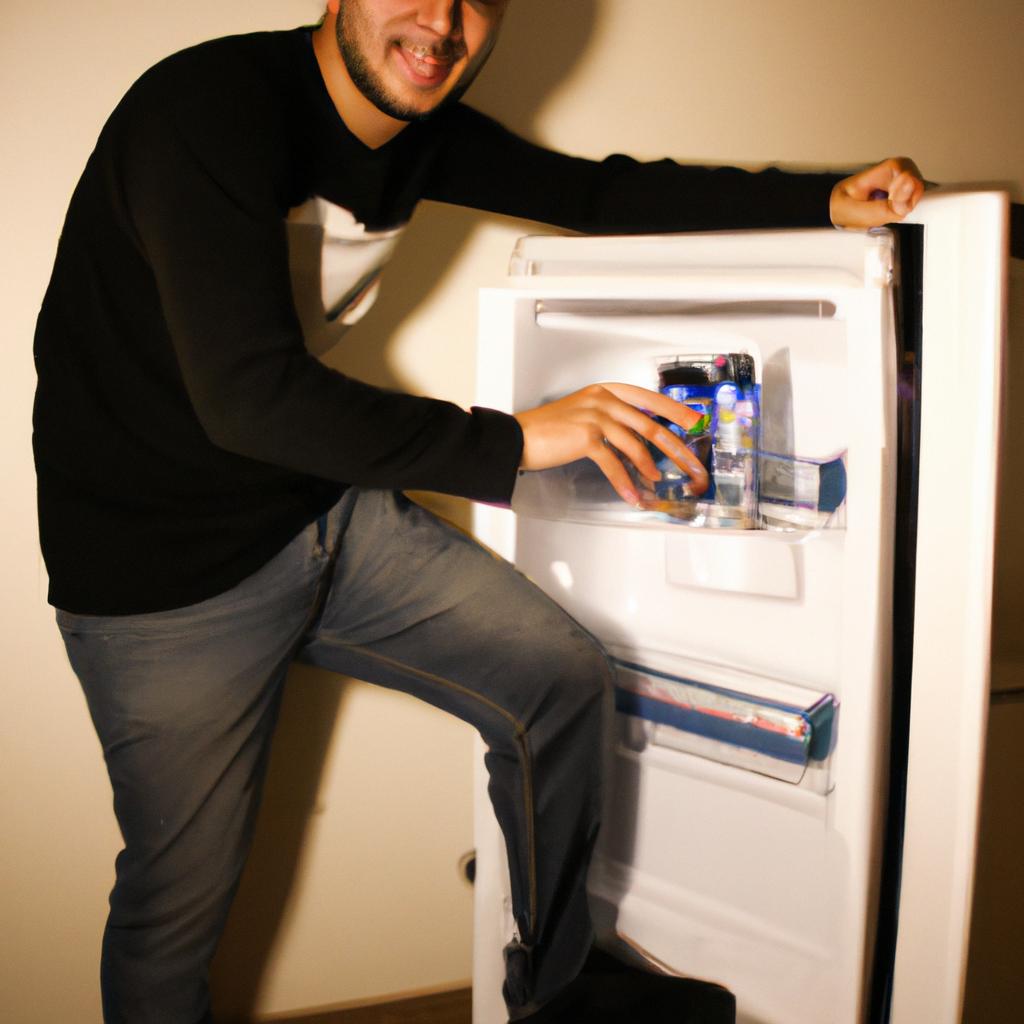 Person using mini fridge, smiling